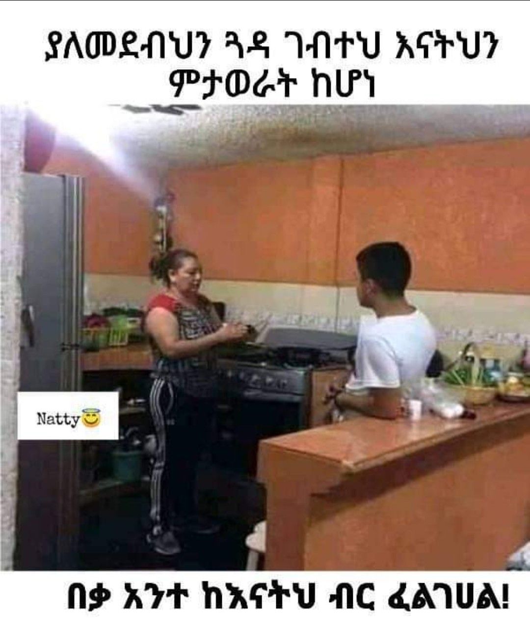 a man is standing in the kitchen with a woman